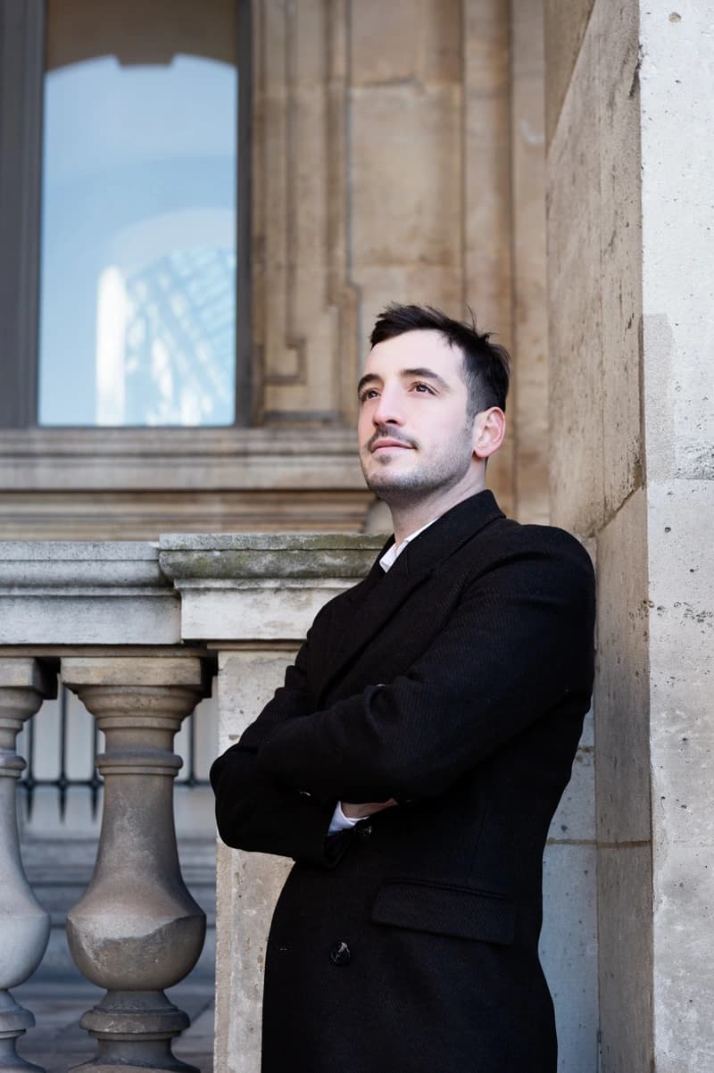 Candid professional photo of Juan Ignacio Torriconi in a meeting